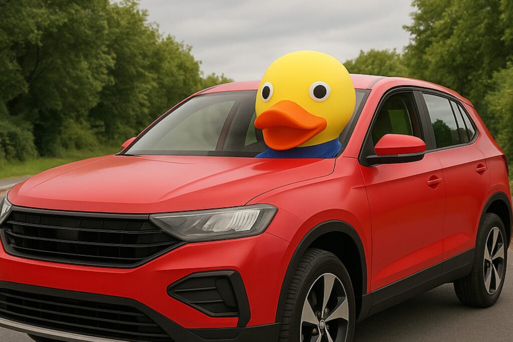 Duck mascot on the bonnet of a car ready to move house