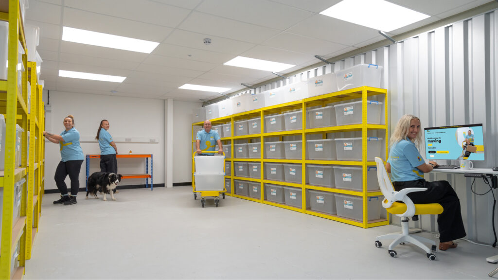 Archive and document storage room with yellow racking full of archive boxes